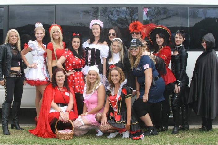 Hens costume ideas - a group of hens dressed up in colourful fancy dress before their Hens Treasure Hunt.